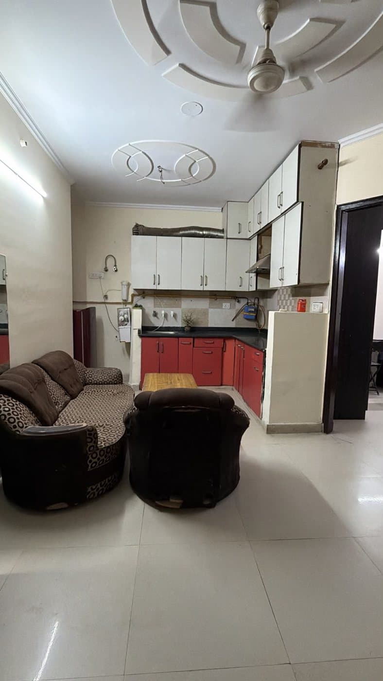Common area with seating and an open kitchen