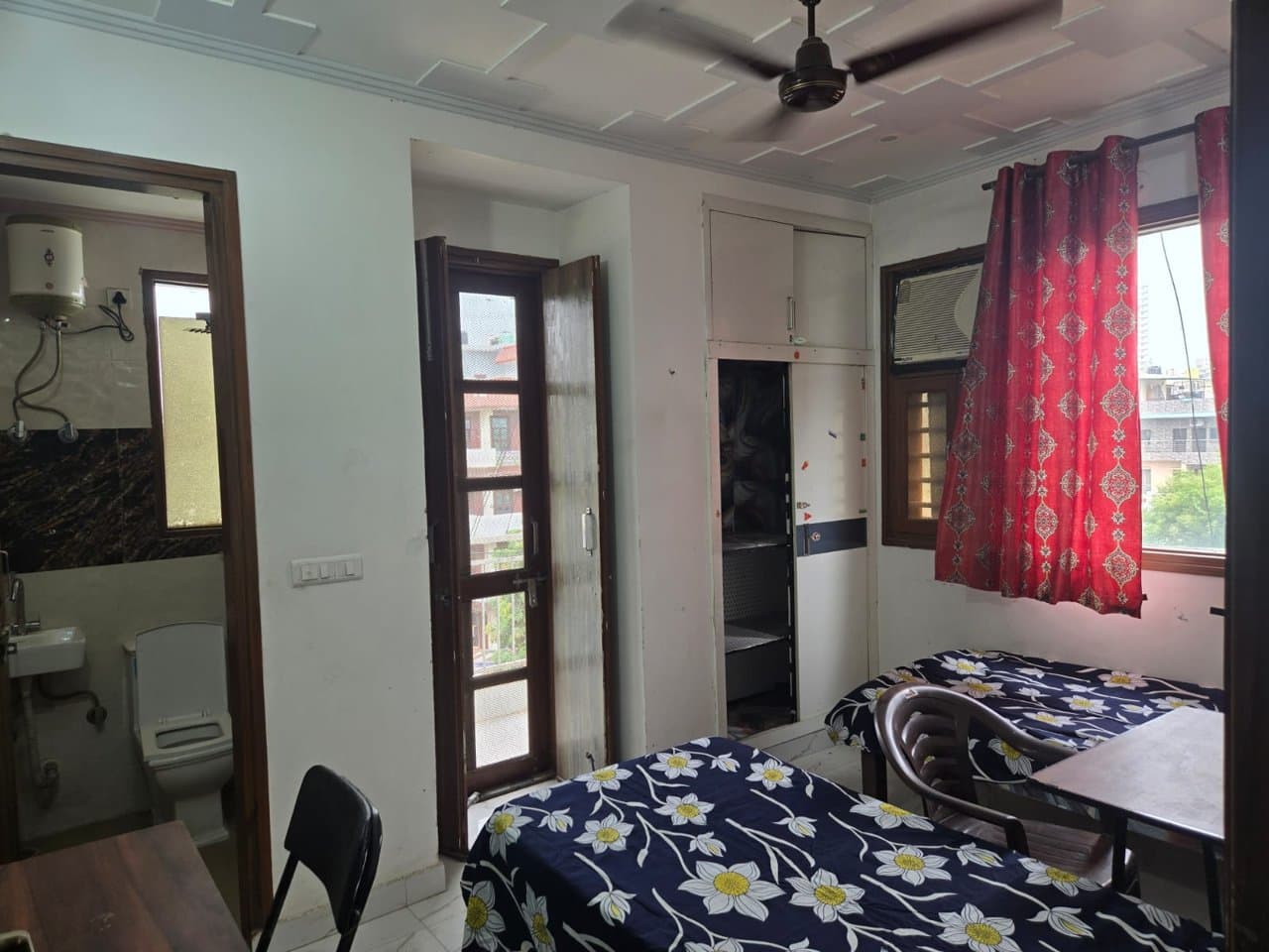 Airy room with balcony and natural light